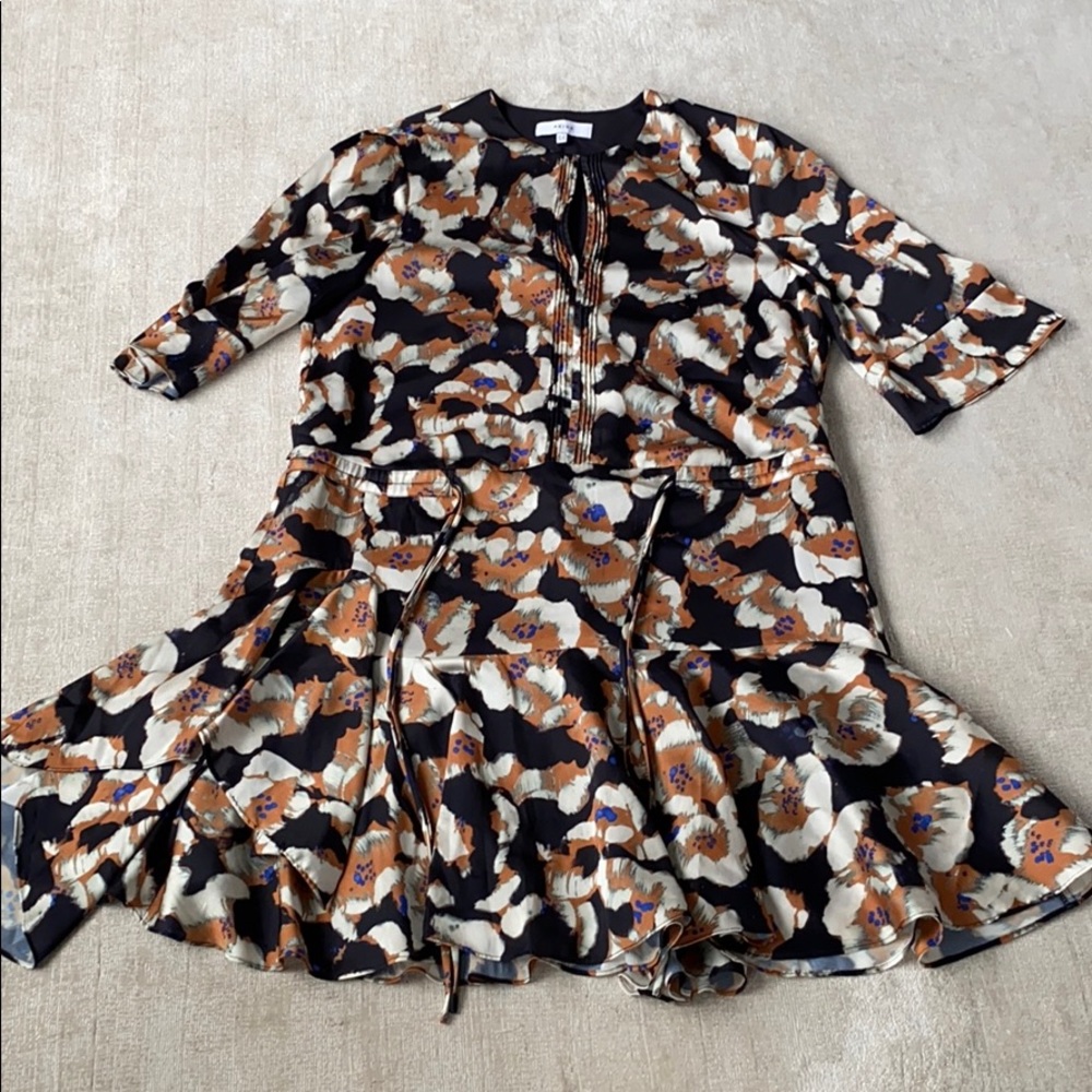 Elegant shirt dress takes you from day to evening.